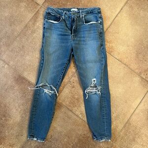 Khloé Kardashian’s Good American Distressed Blue Jeans